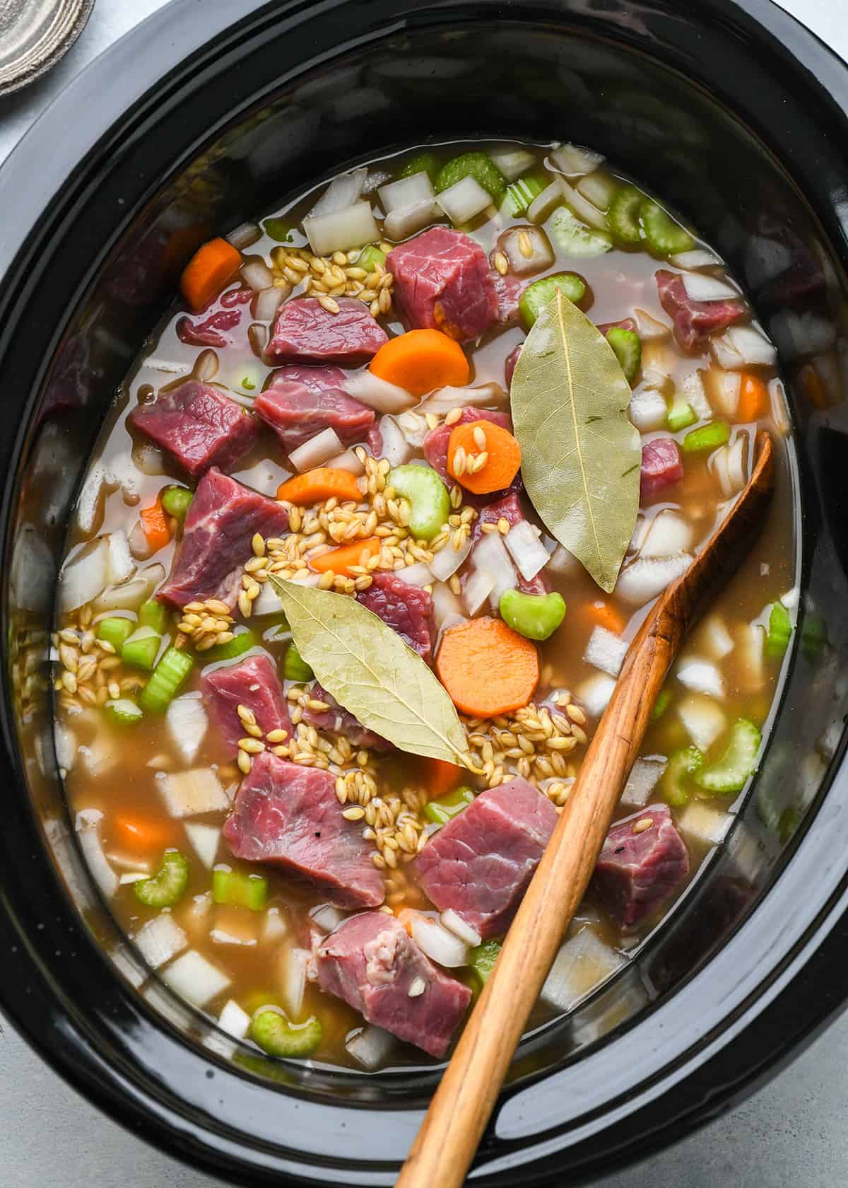Beef Barley Soup in a slow cooker before cooking