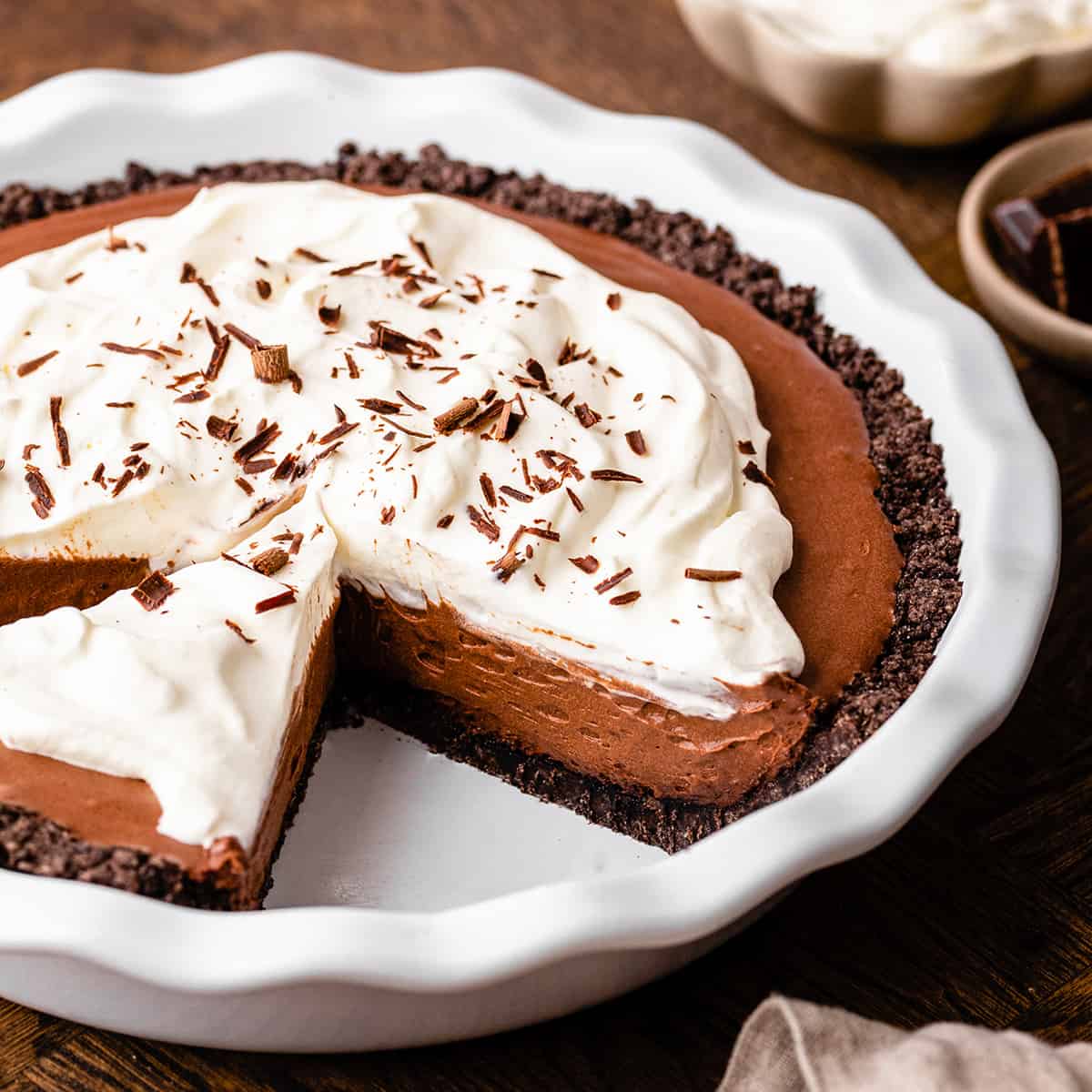 Chocolate Pudding Pie with a slice cut out of it