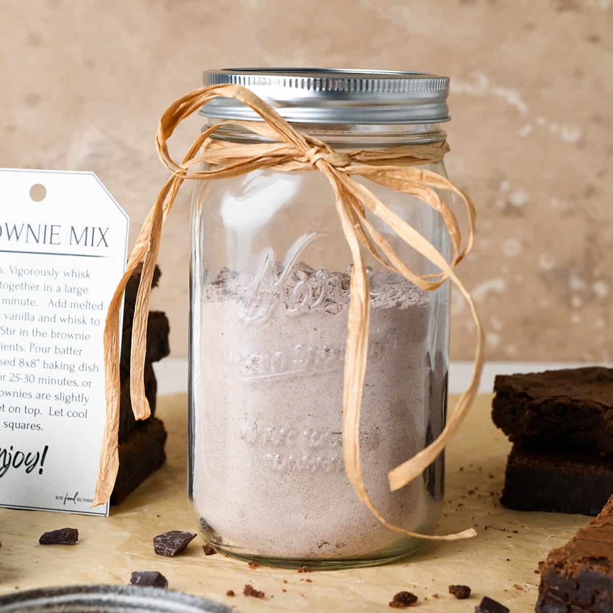 Homemade Brownie Mix in a glass jar with a bow