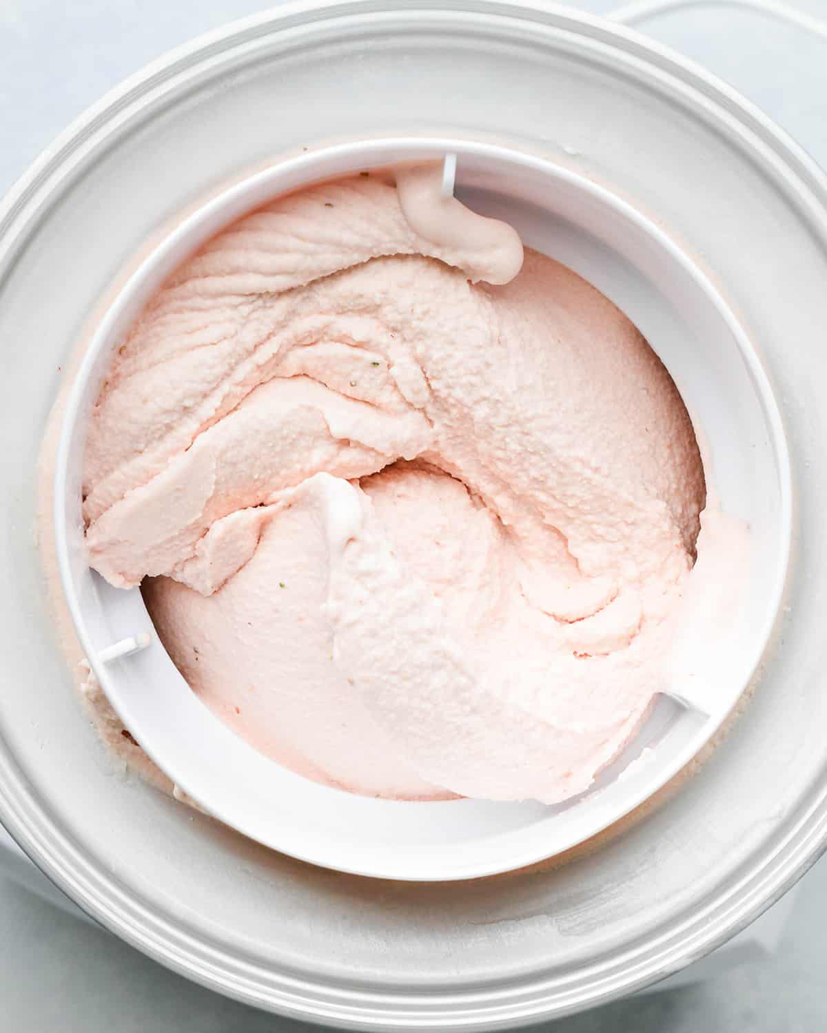 strawberry ice cream churned in an ice cream maker