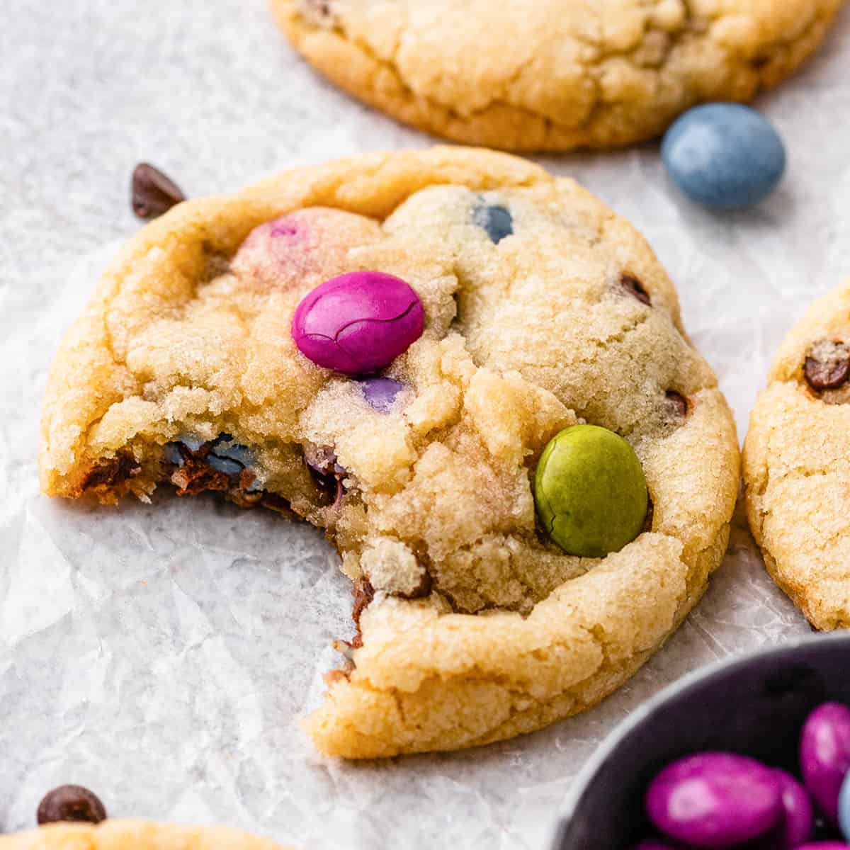 an M & M Cookie with a bite taken out of it