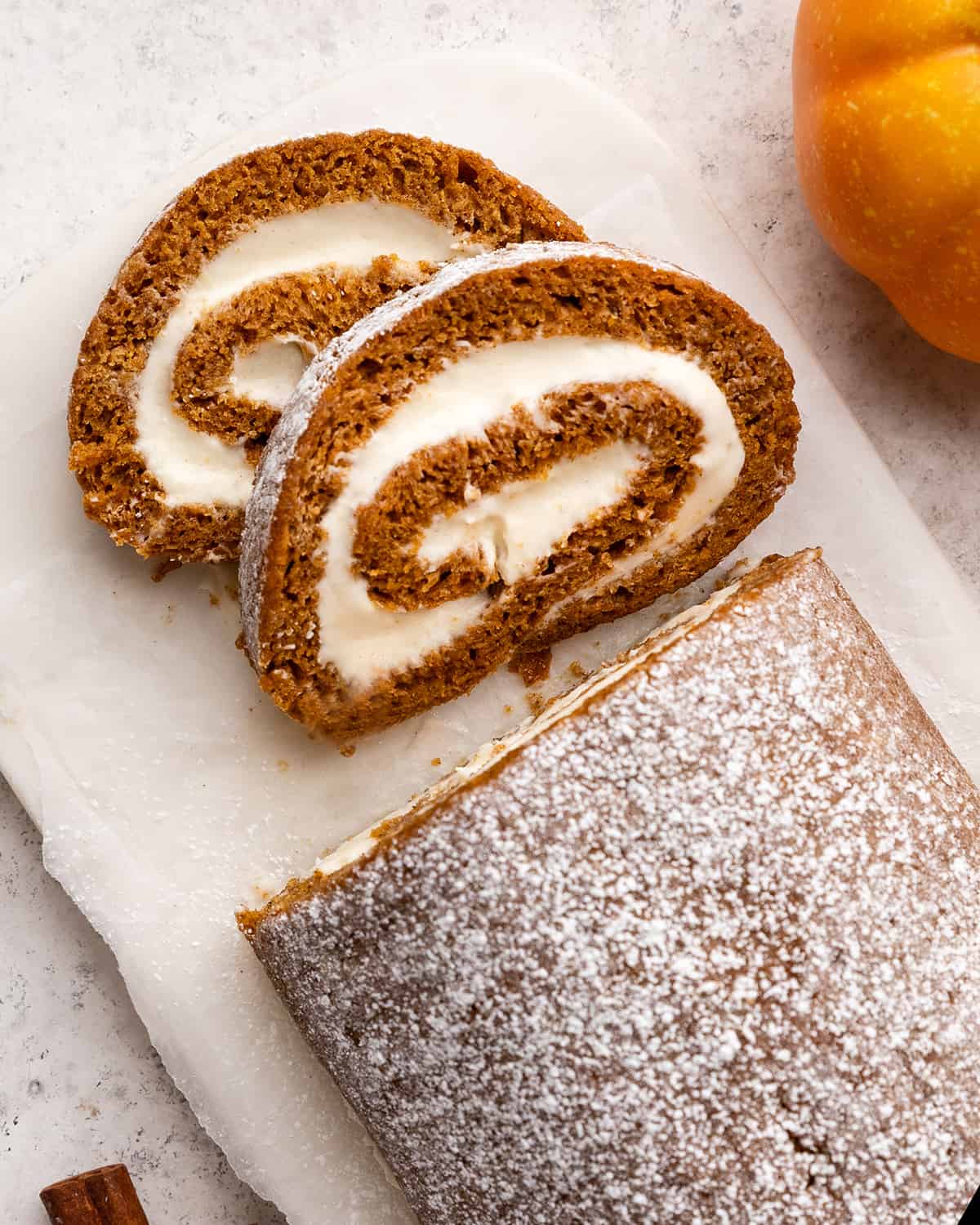 overhead view of two slices of Pumpkin Roll Cake