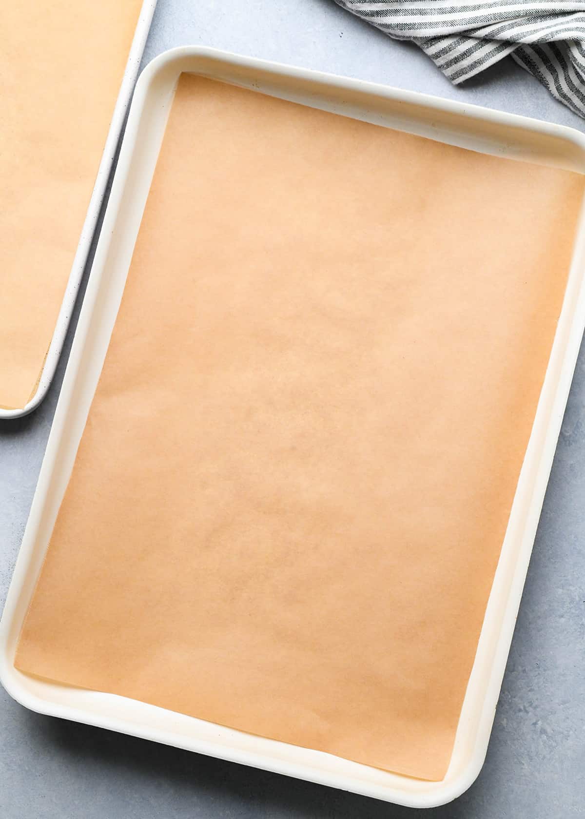 two baking sheets lined with parchment paper