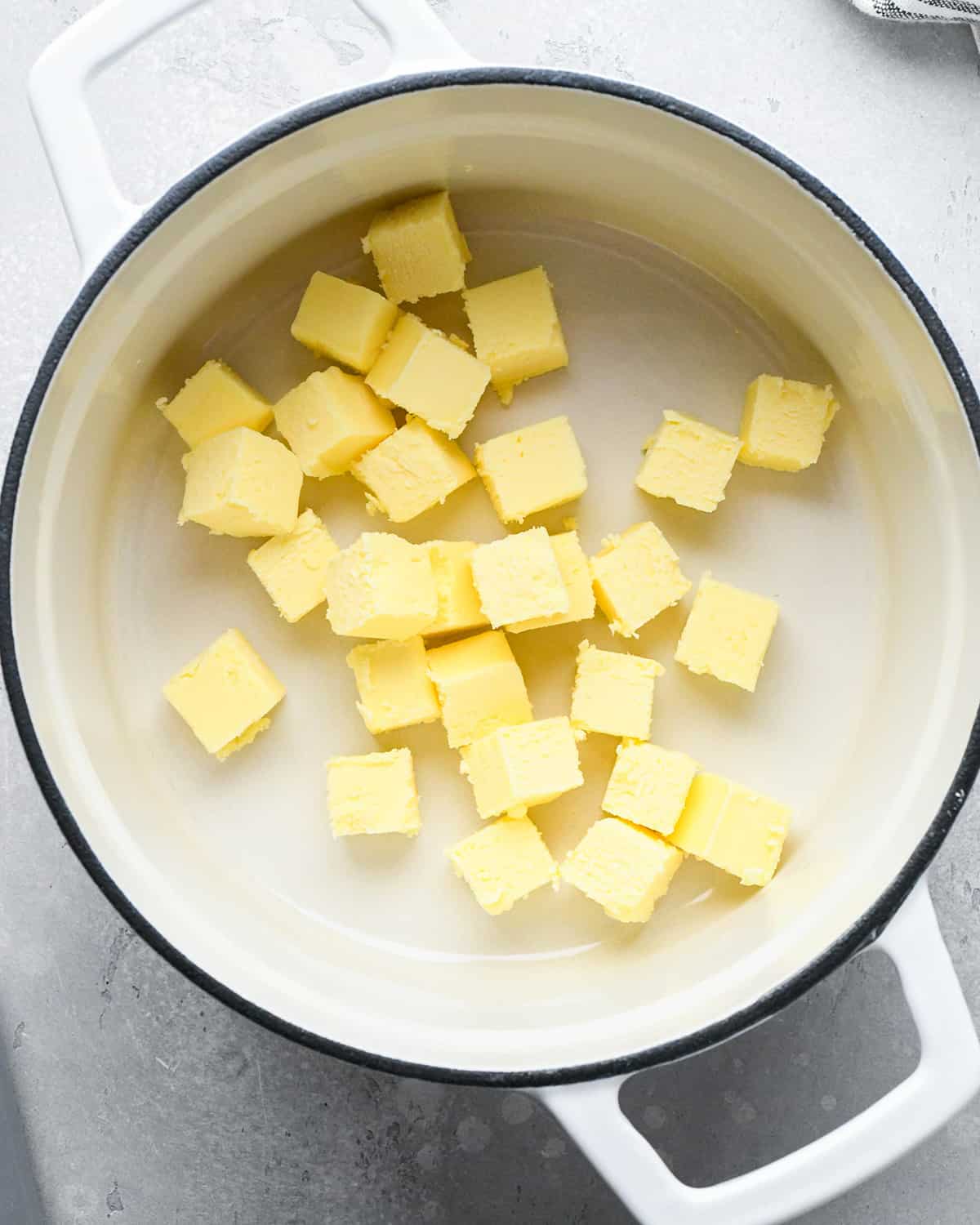 cubed butter in a pan to make browned butter
