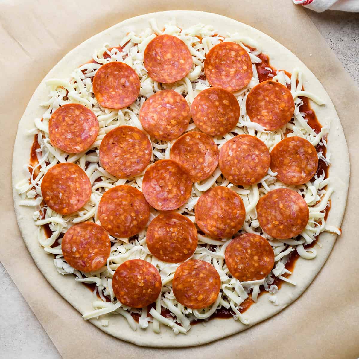 How to Make Pepperoni Pizza - pepperoni on top of cheese