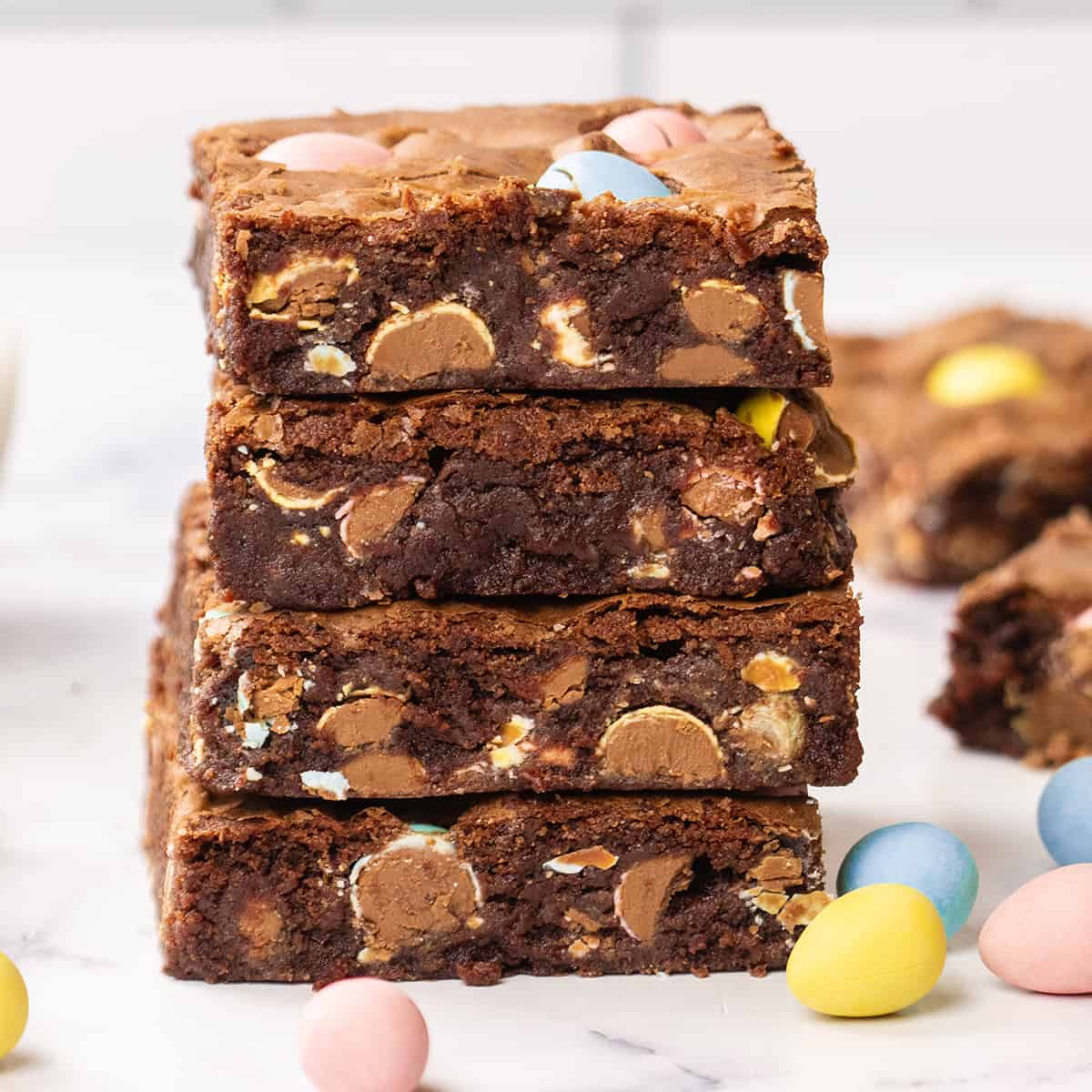 a stack of 4 mini egg brownies
