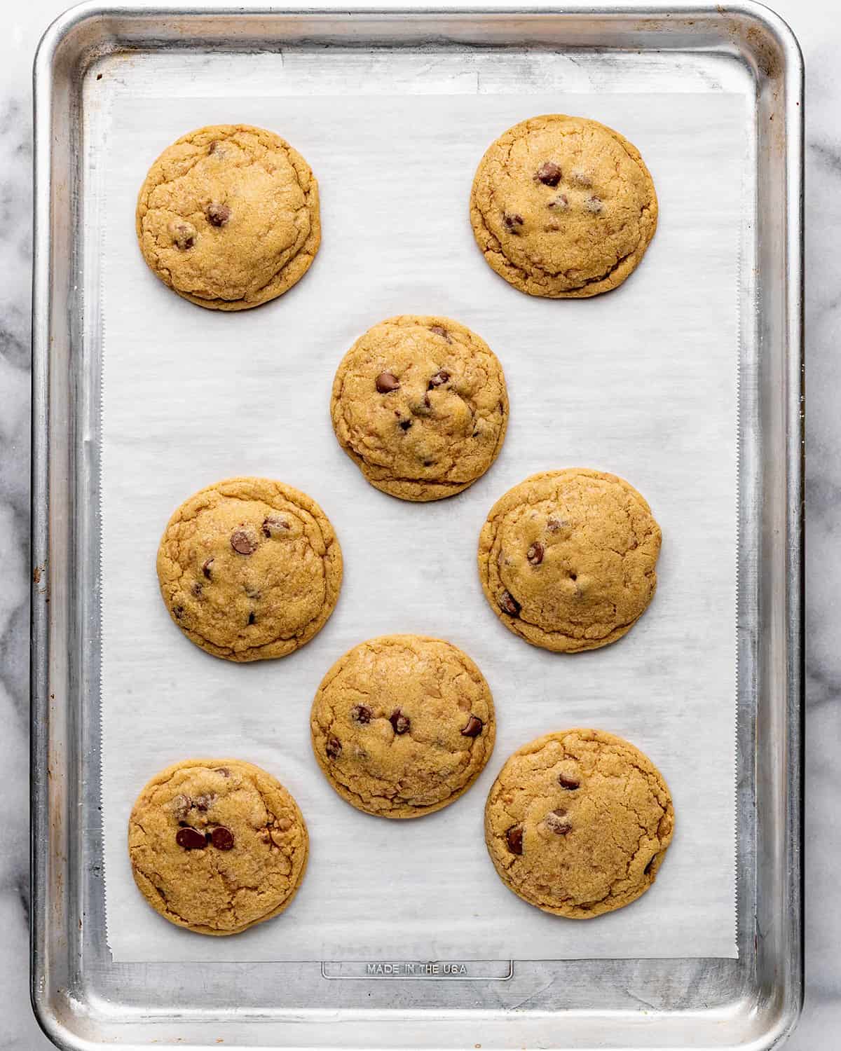 8 Toffee Cookies on a baking sheet before baking