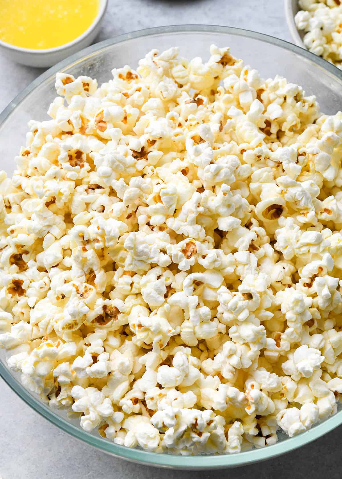 overhead photo of Butter Popcorn in a glass bowl