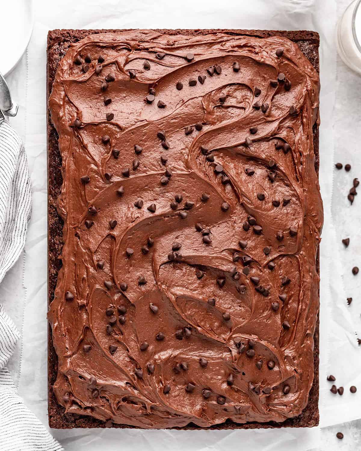 Chocolate Sheet Cake frosted with chocolate frosting and sprinkled with chocolate chips