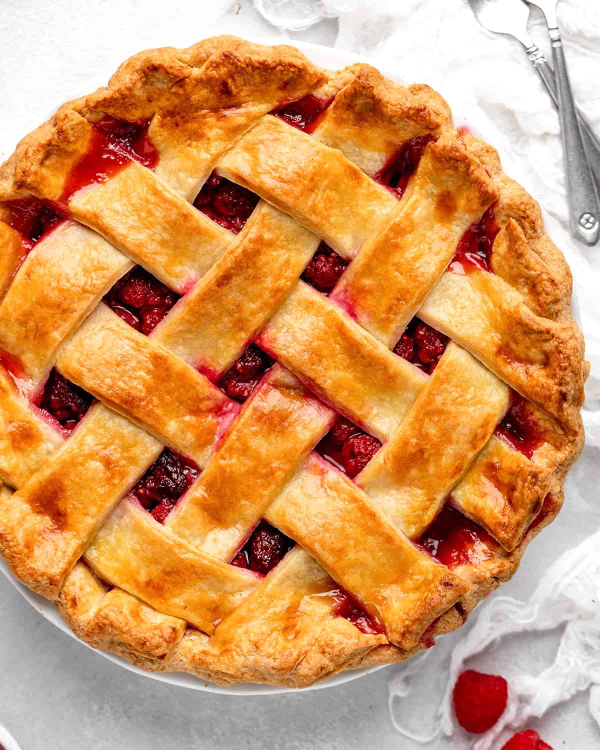 overhead view of a Raspberry Pie with a lattice crust