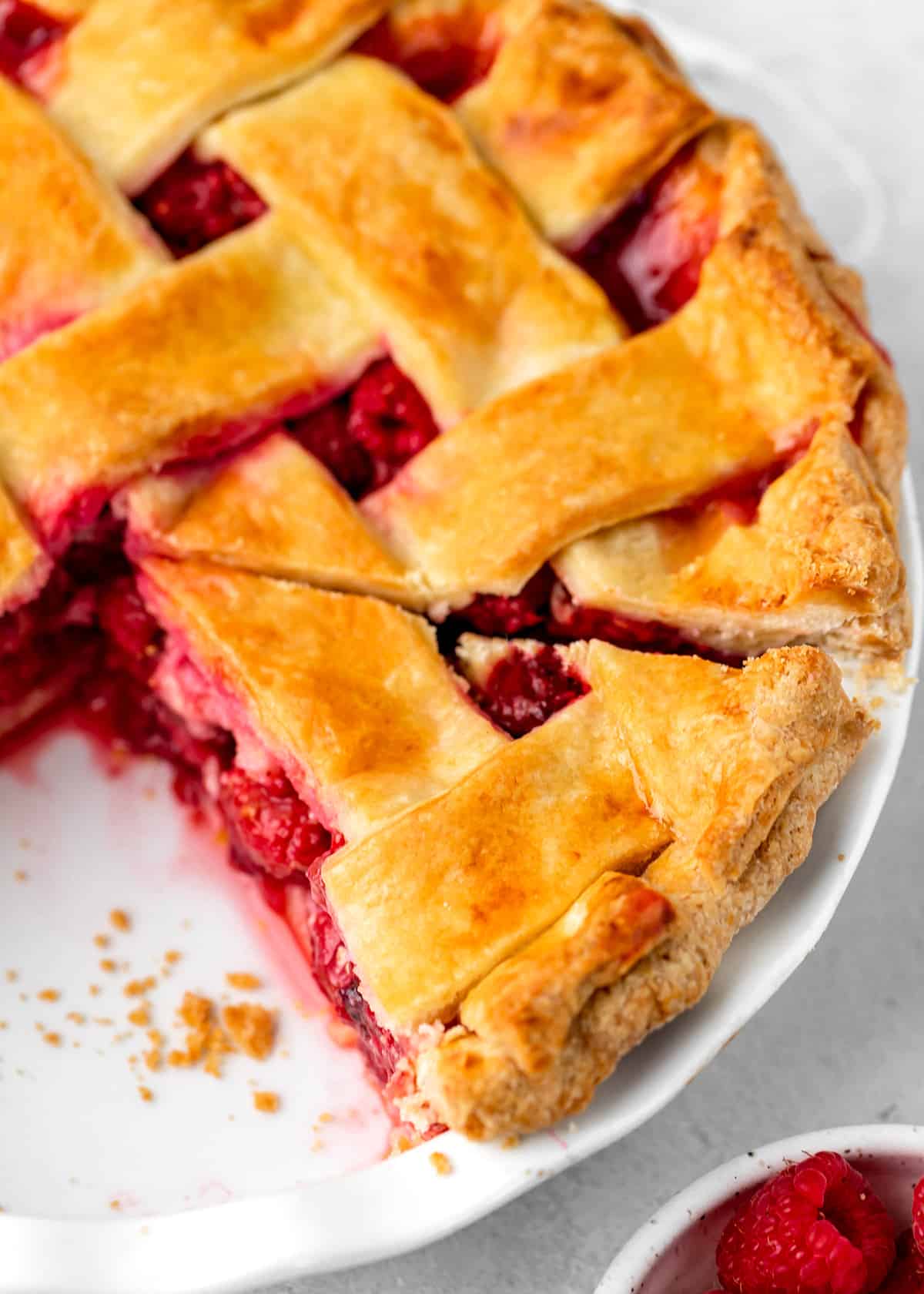 Raspberry Pie with a slice cut out of it