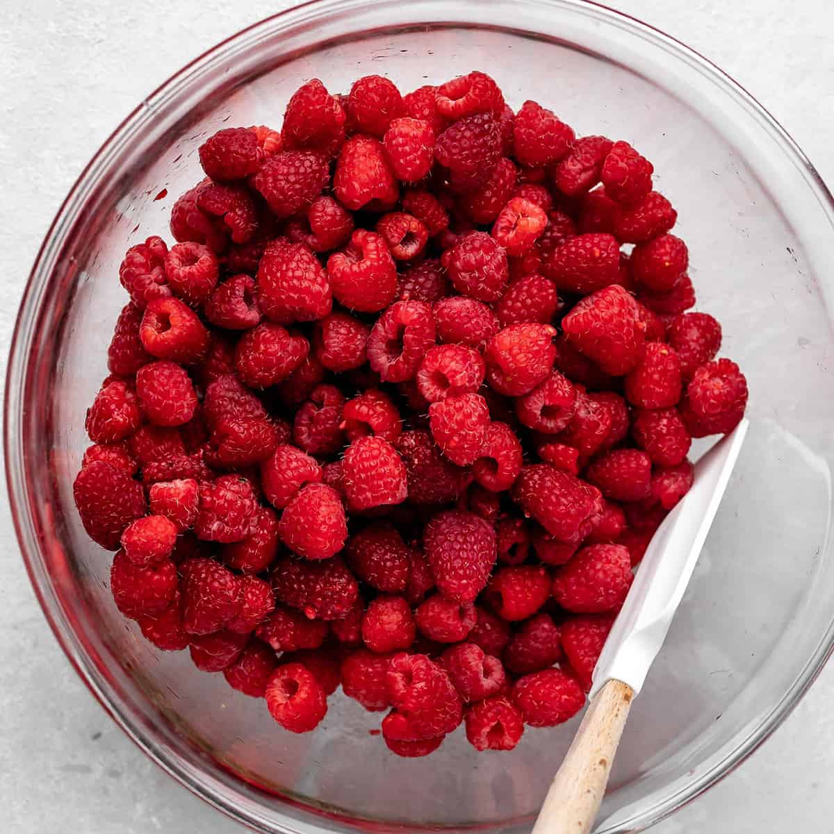 raspberries in a bowl to make raspberry pie filling