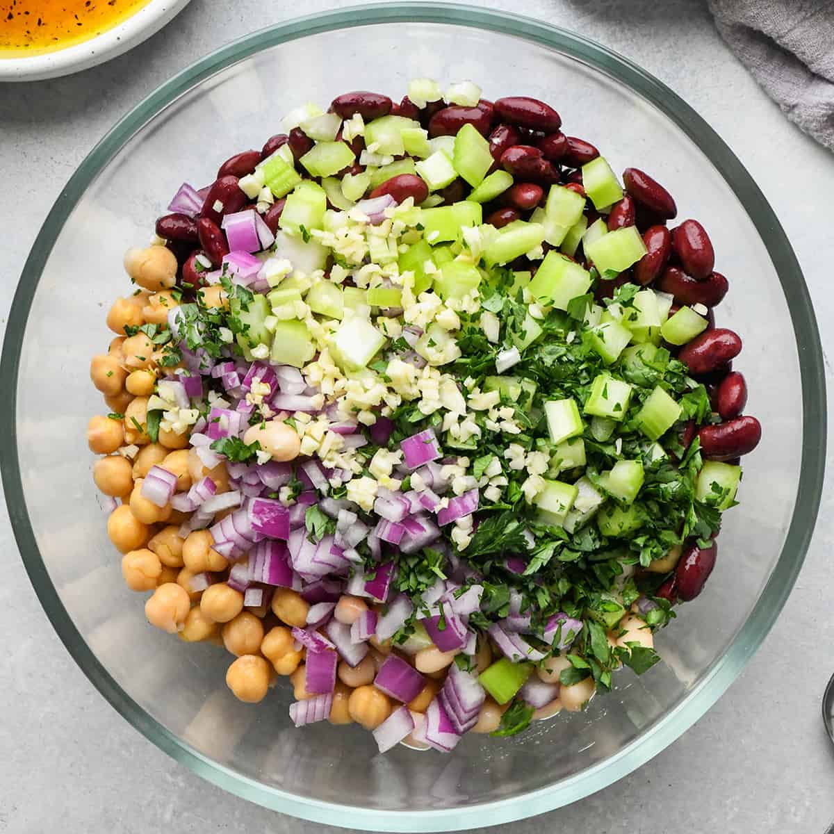 3 Bean Salad ingredients in a bowl before mixing