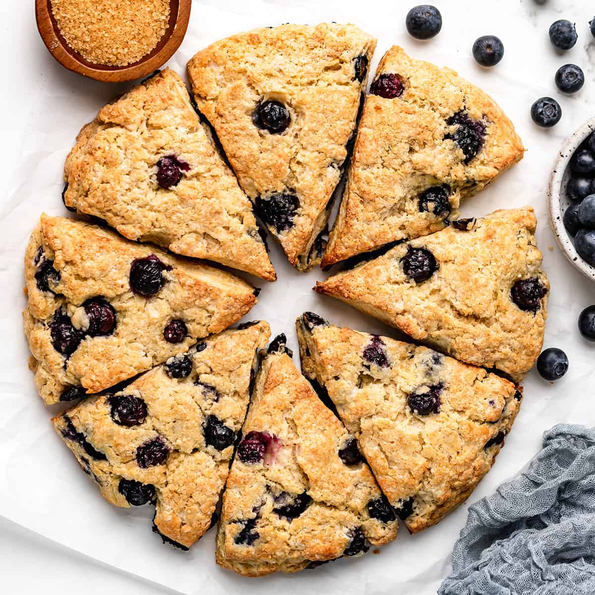 8 blueberry scones arranged in a circle