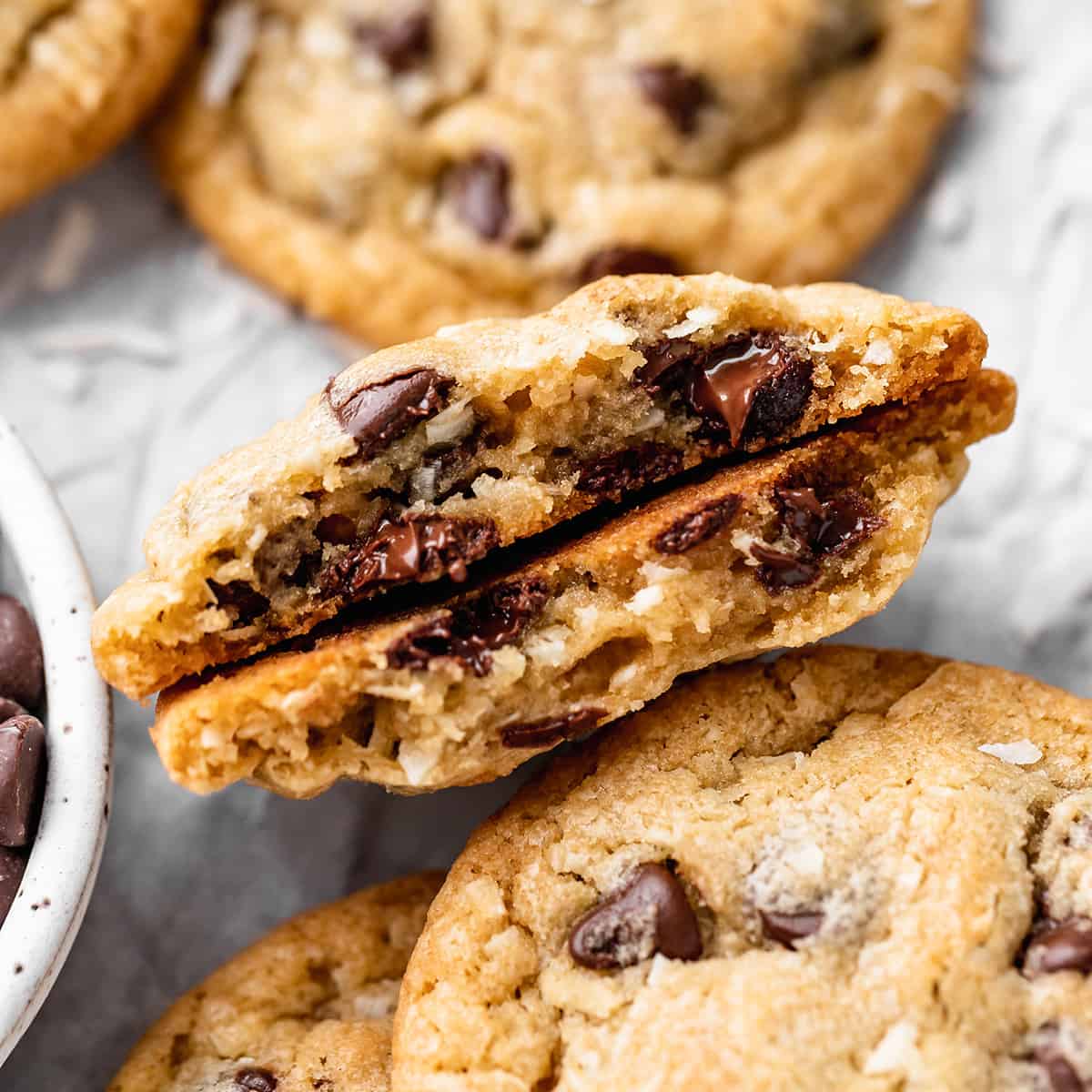 Coconut Chocolate Chip Cookies cut in half so the inside is showing