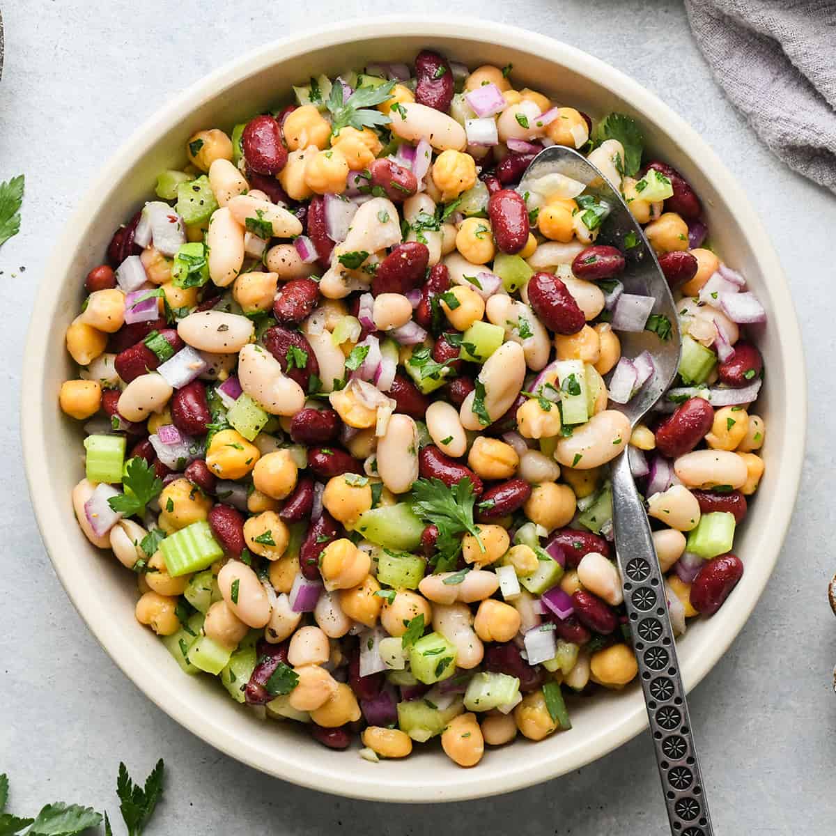 3 Bean Salad in a bowl with a spoon