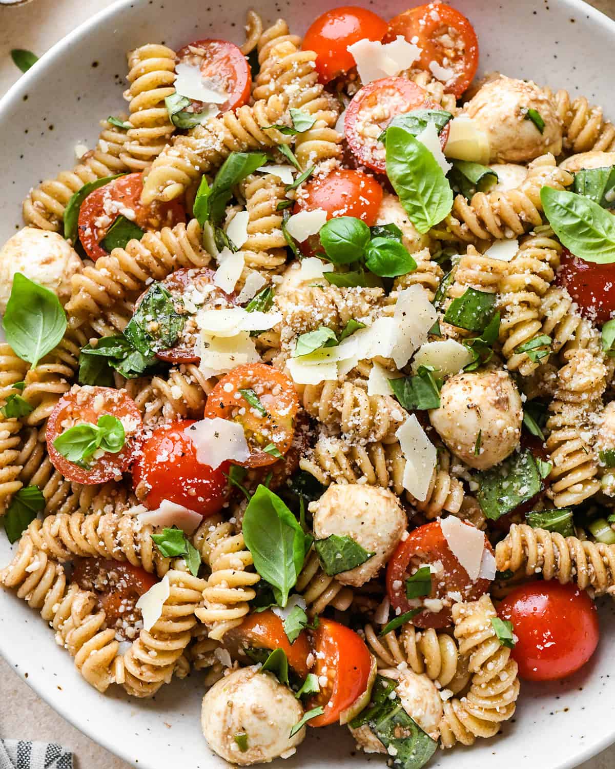 up close photo of Caprese Pasta Salad in a bowl