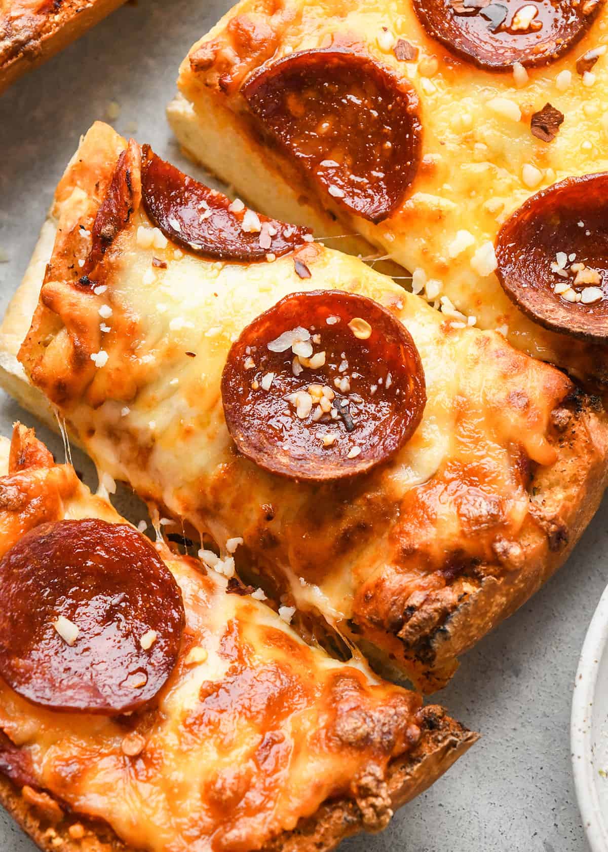 up close photo of pepperoni French Bread Pizza