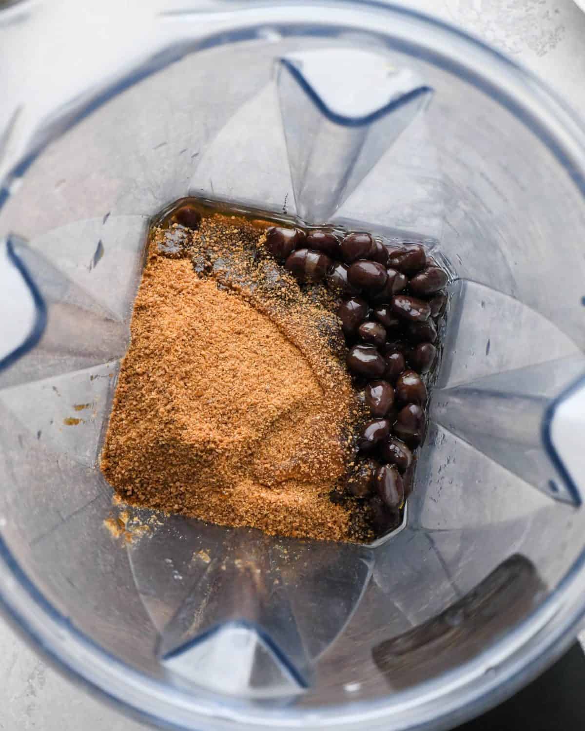 making black bean brownies - beans, coconut oil and coconut sugar in a blending container before blending