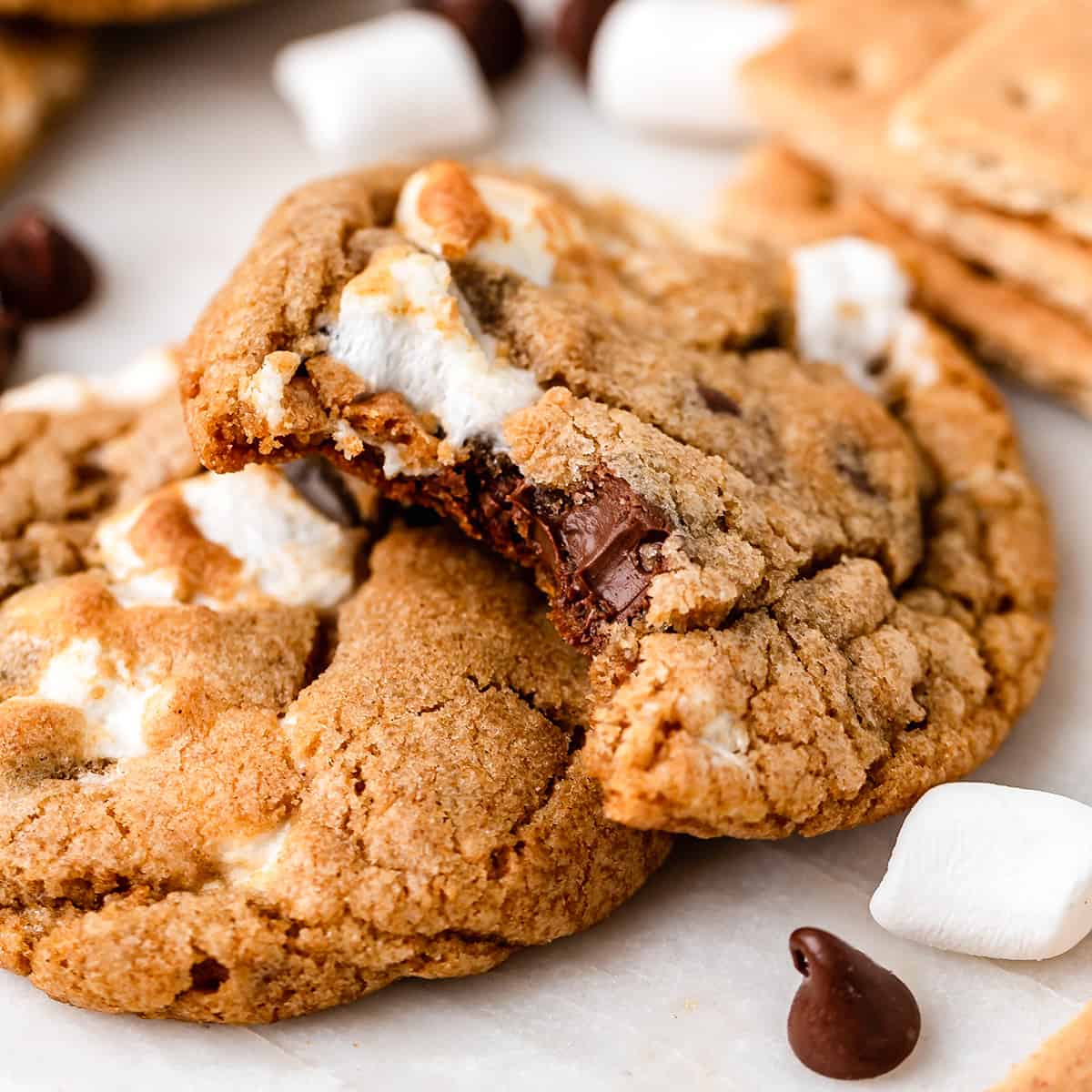 2 S'mores Cookies, one with a bite taken out of it