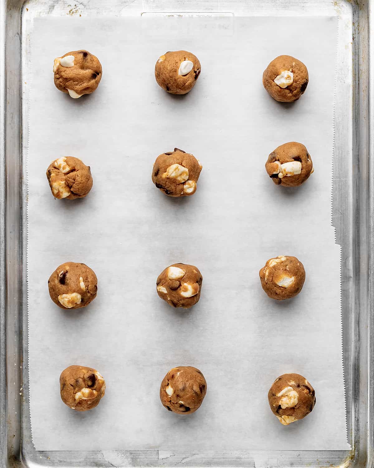 S'mores Cookies dough on a baking pan before baking