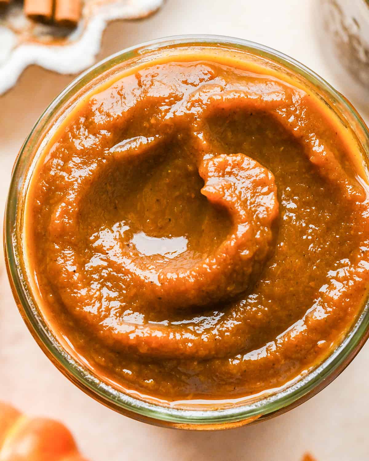 up close overhead photo of Pumpkin Butter in a glass jar