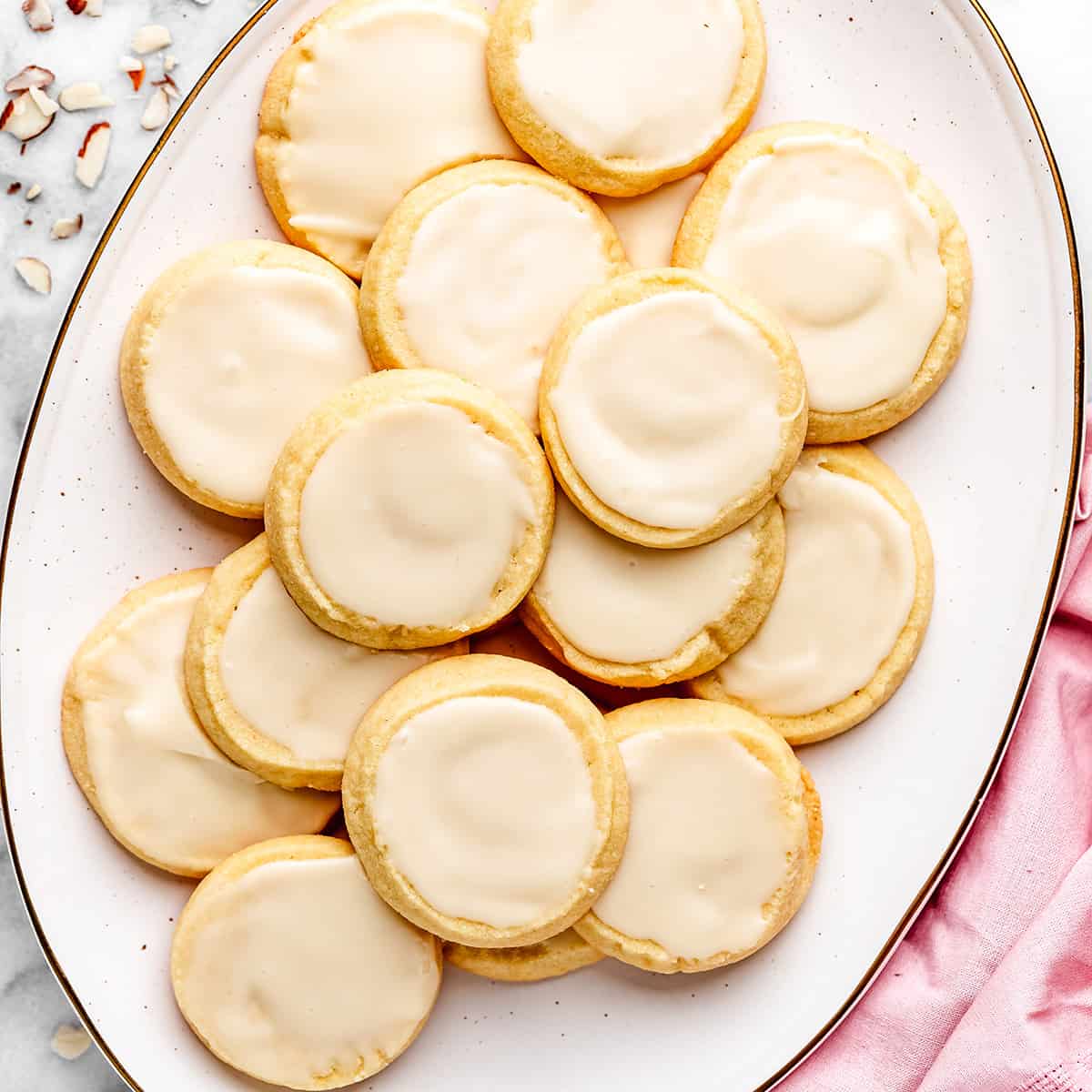 15 Almond Cookies with glaze on a plate