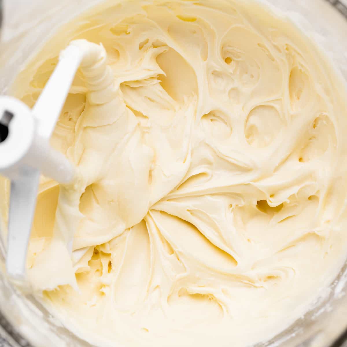 cream cheese frosting in a mixing bowl