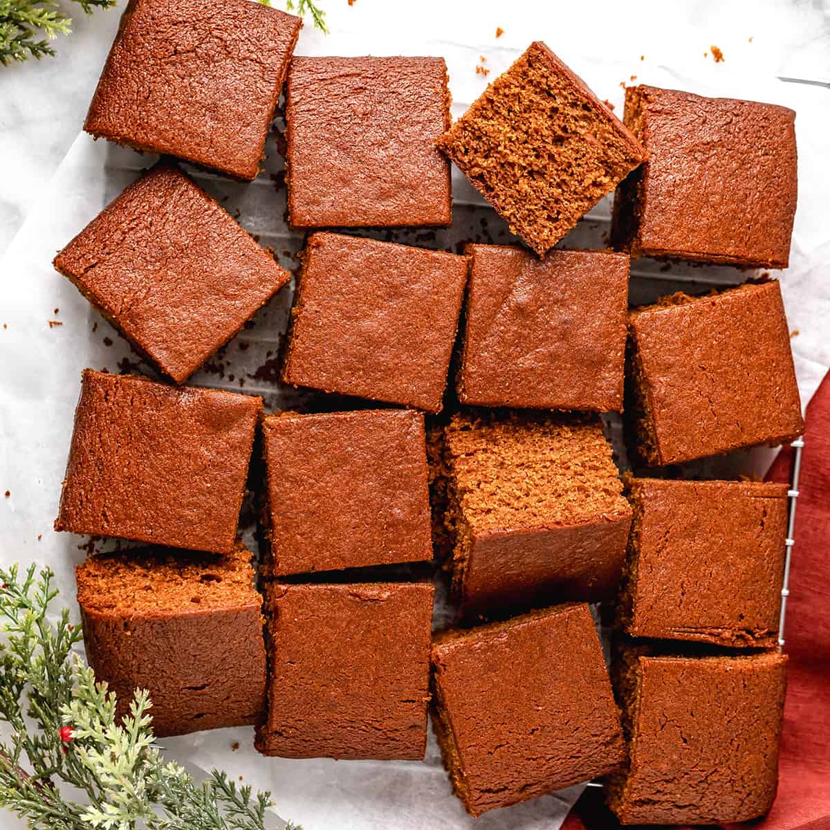 gingerbread cut into 16 squares on a wire cooling rack