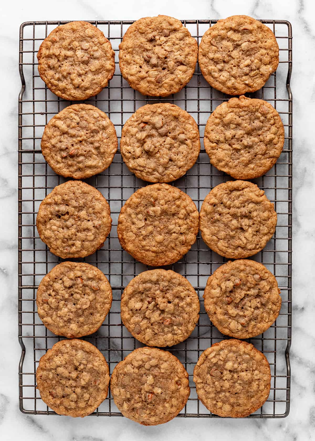 Homemade Oatmeal Cream Pie cookies on a wire cooling rack
