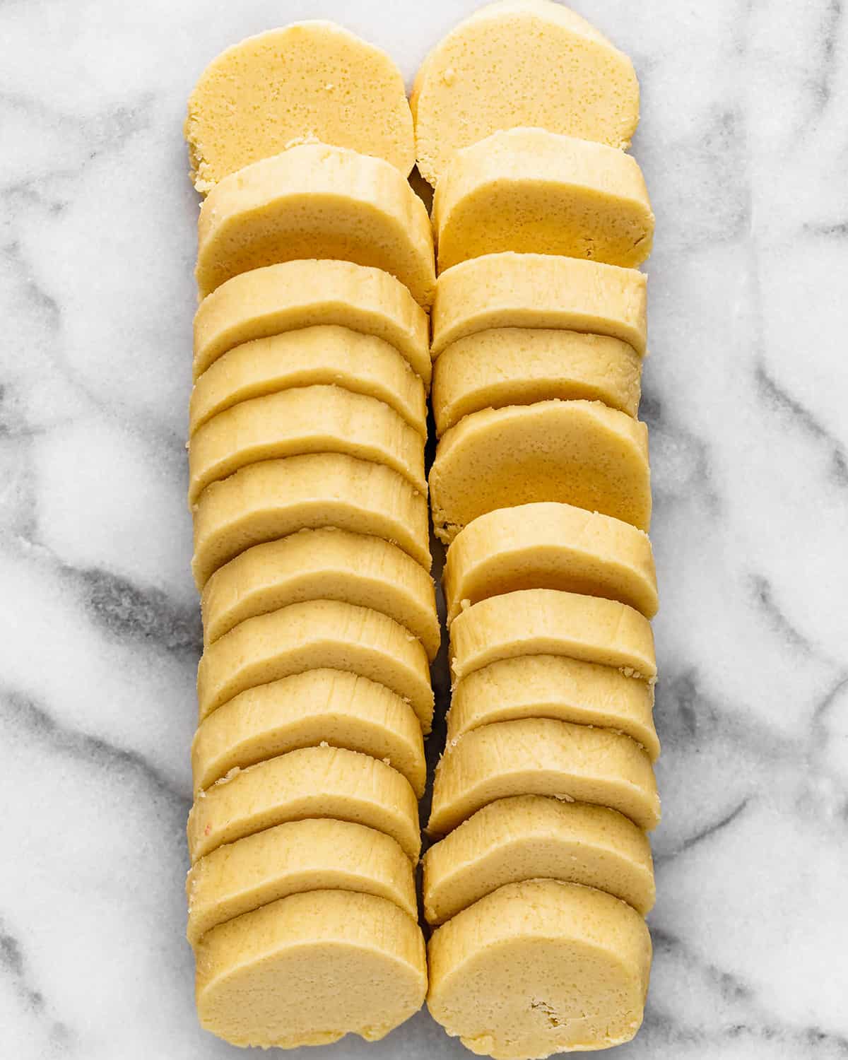 almond cookie dough cut into round circles