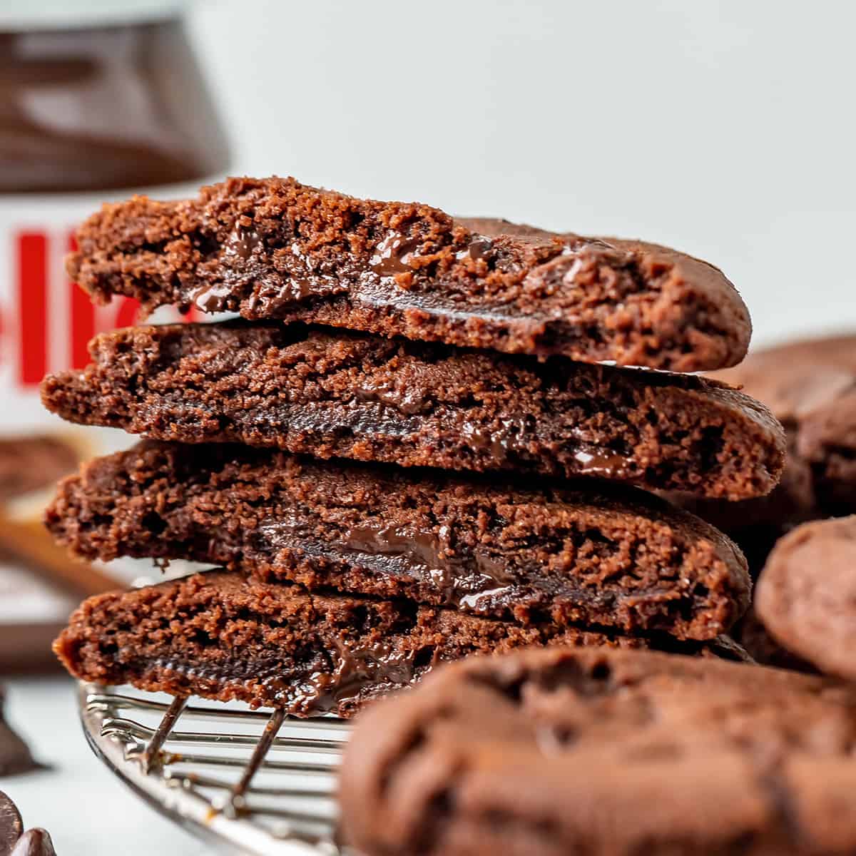 4 halves of Nutella Cookies stacked on top of each other 