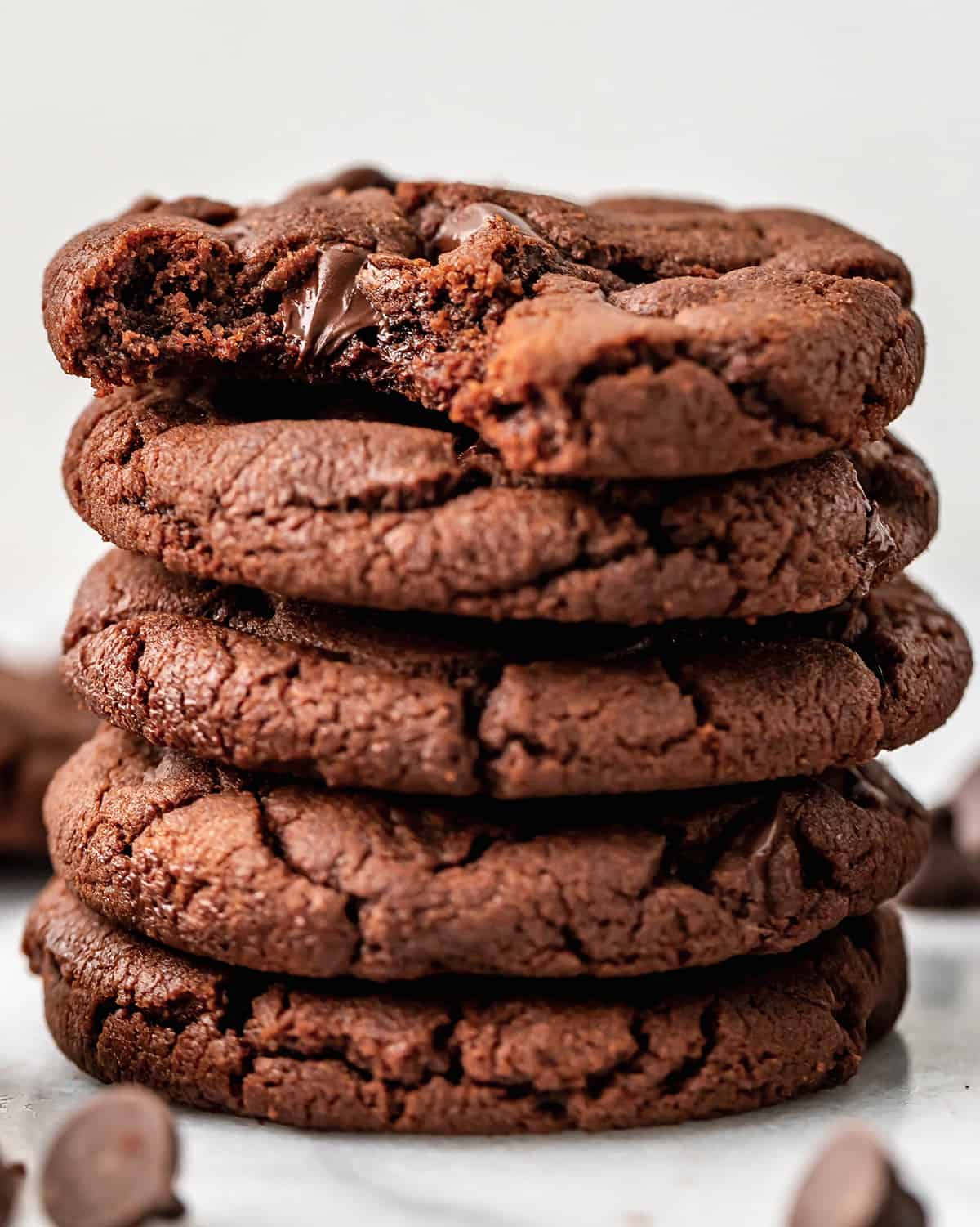 a stack of 5 Nutella Cookies, the top one has a bite taken out of it