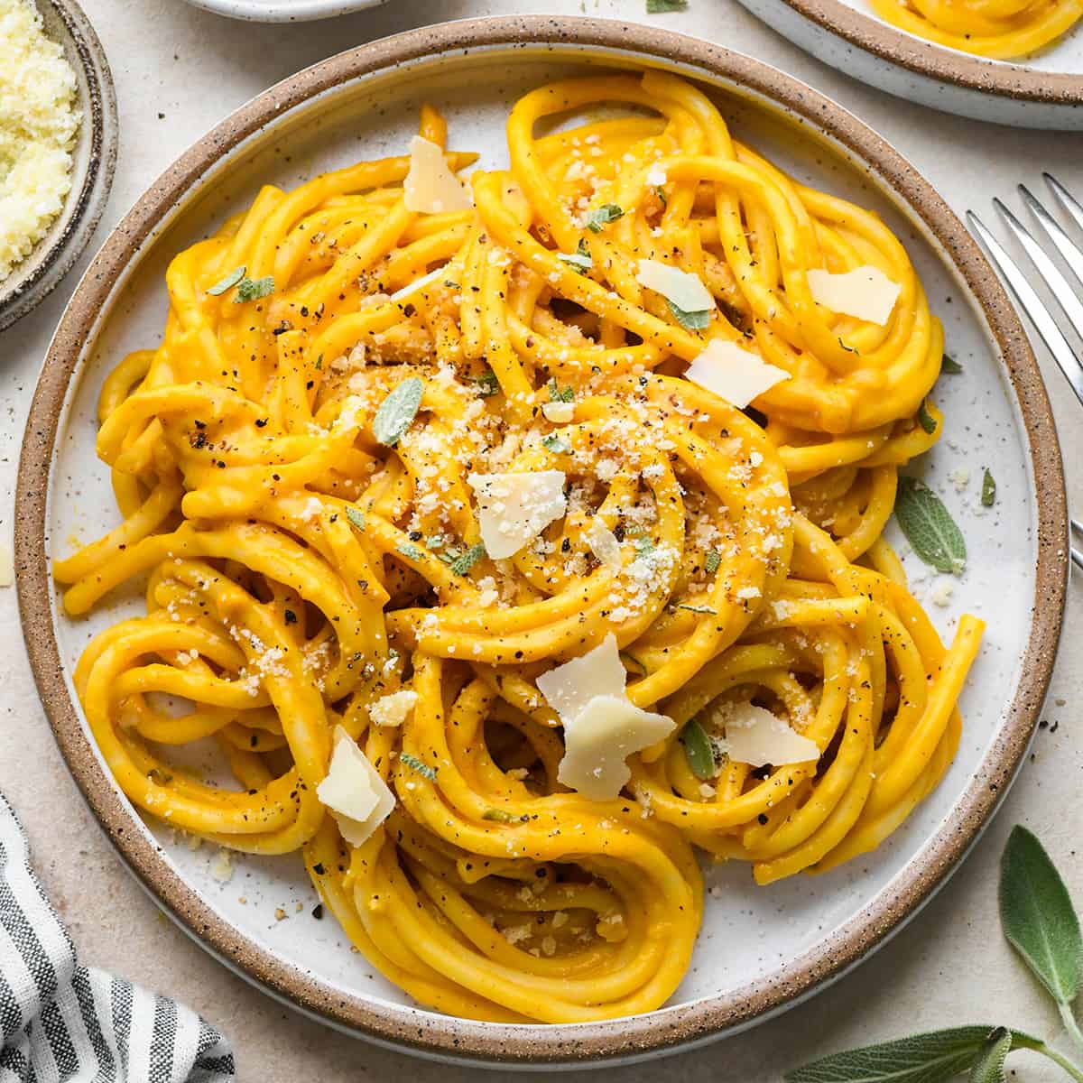 Pumpkin Pasta on a plate garnished with parmesan and sage