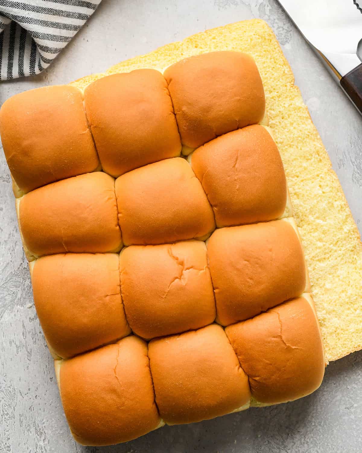 a pack of hawaiian rolls cut in half lengthwise to make Turkey Sliders