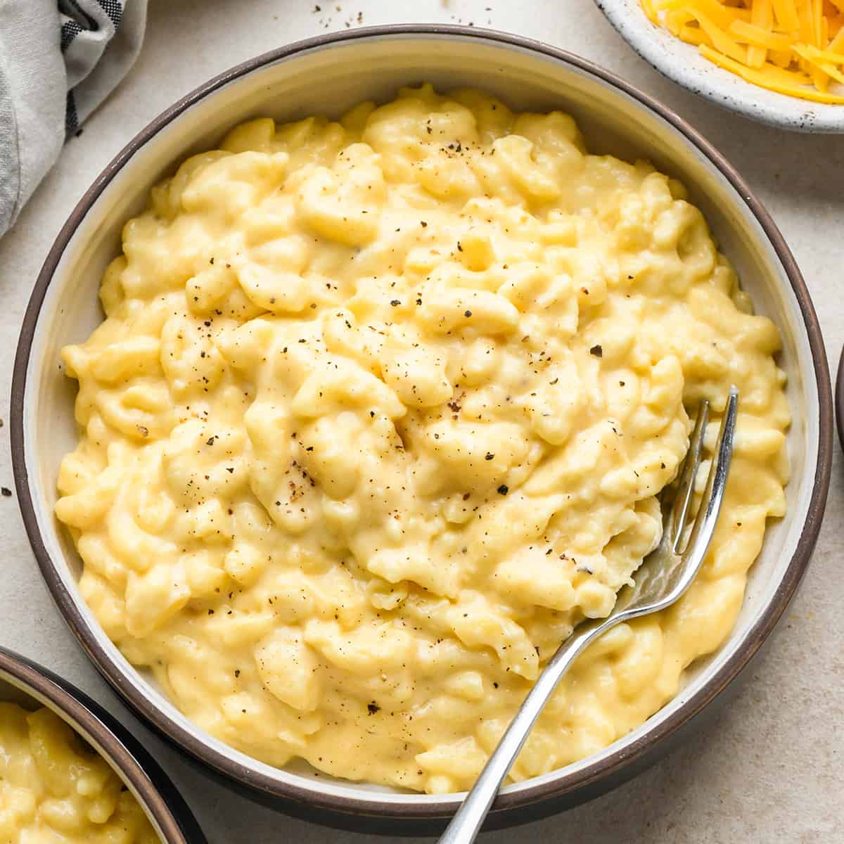 a bowl of Crock Pot Mac and Cheese with a fork