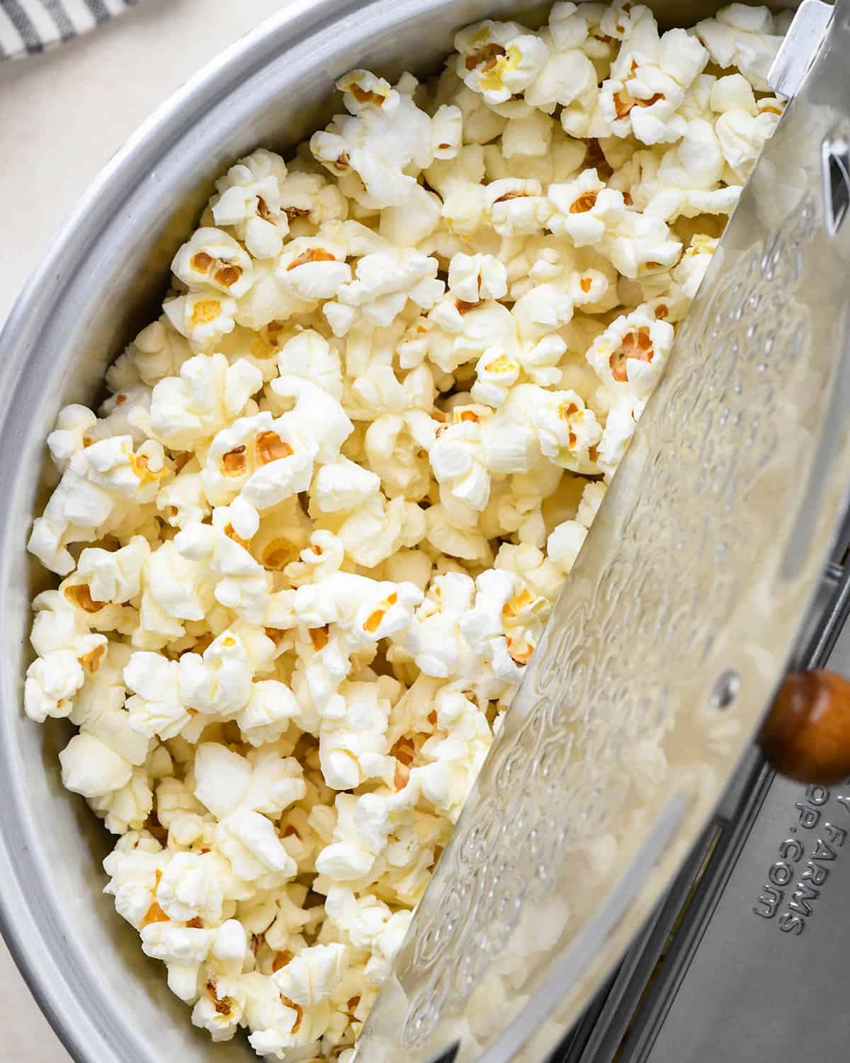 popped popcorn in a popcorn maker to make caramel corn