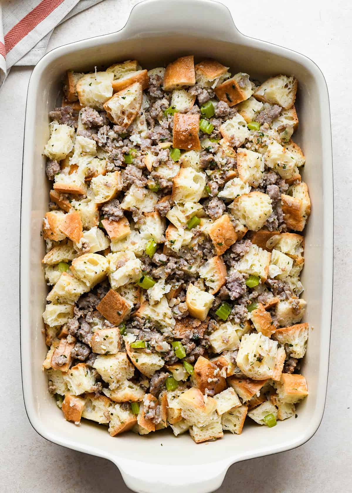 bread stuffing in a baking dish before baking