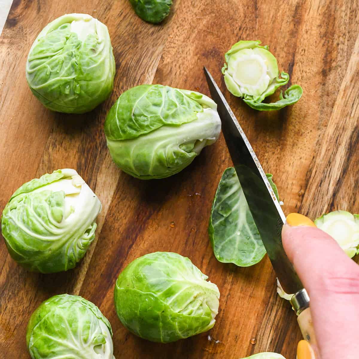 trimming brussels sprouts to make roasted brussels sprouts