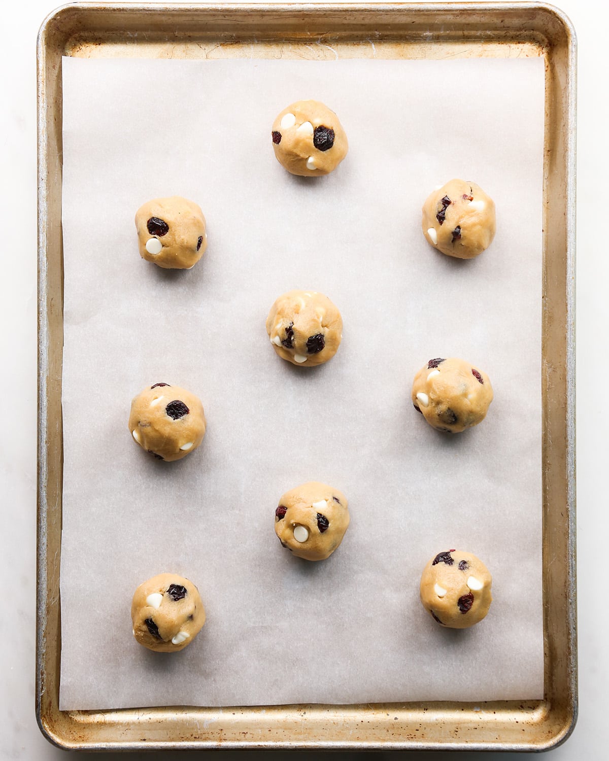 White Chocolate Cranberry Cookies dough on a baking sheet before baking