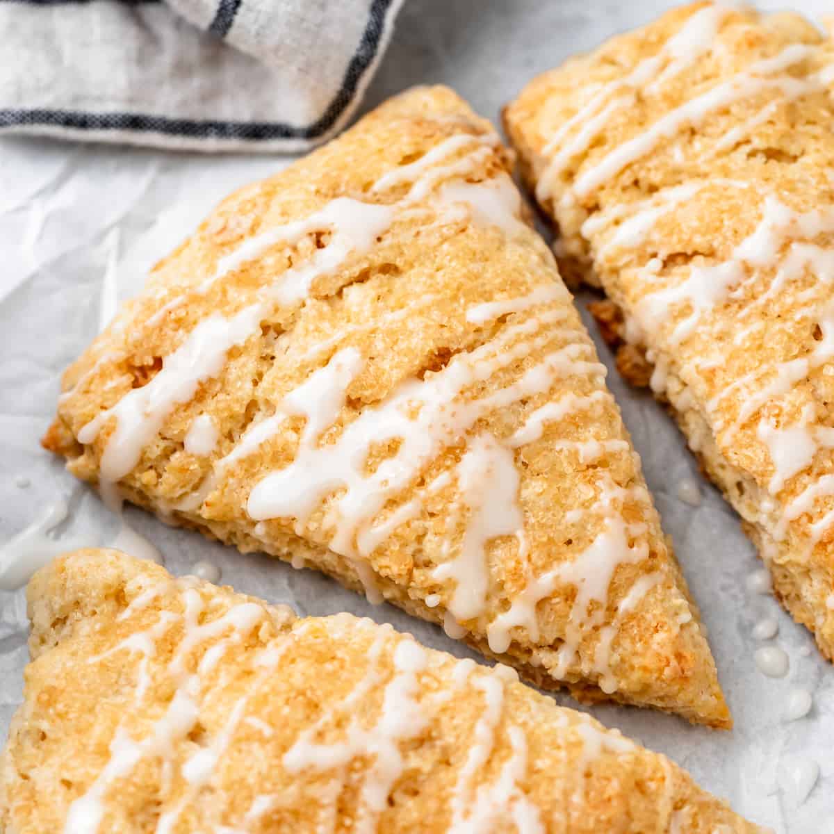 3 Buttermilk Scones drizzled with glaze