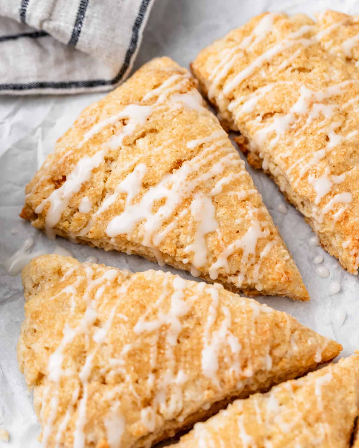 4 Buttermilk Scones drizzled with glaze