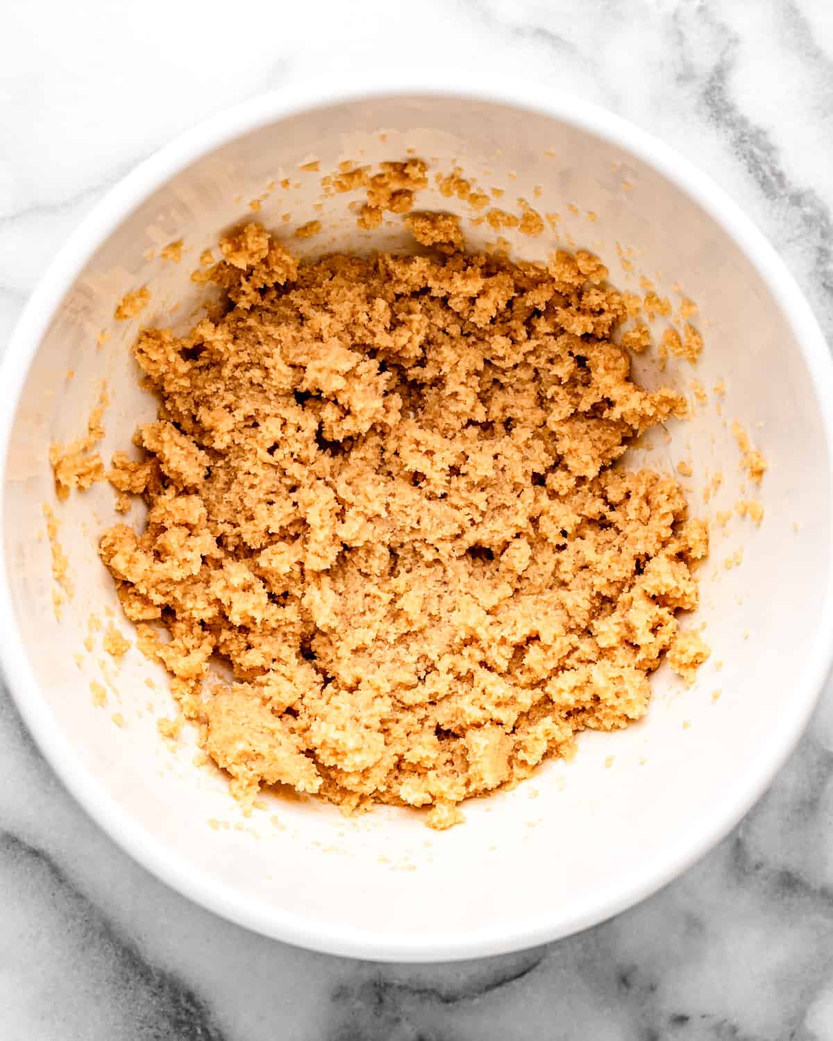 how to make Pistachio Cookies - butter, brown sugar & butter in a bowl after mixing