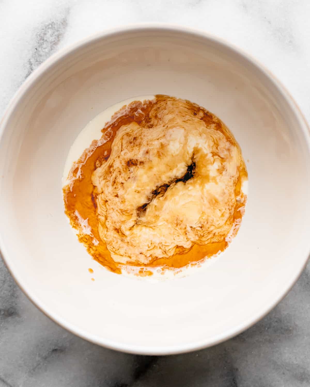 making Maple Glaze in a bowl - wet ingredients before mixing