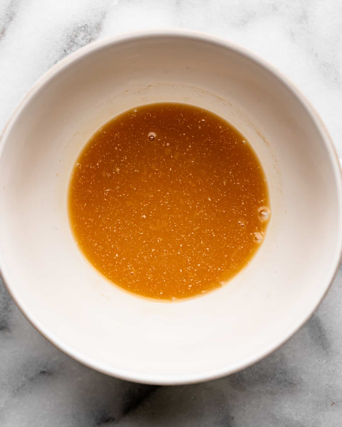 making Maple Glaze in a bowl - wet ingredients after mixing