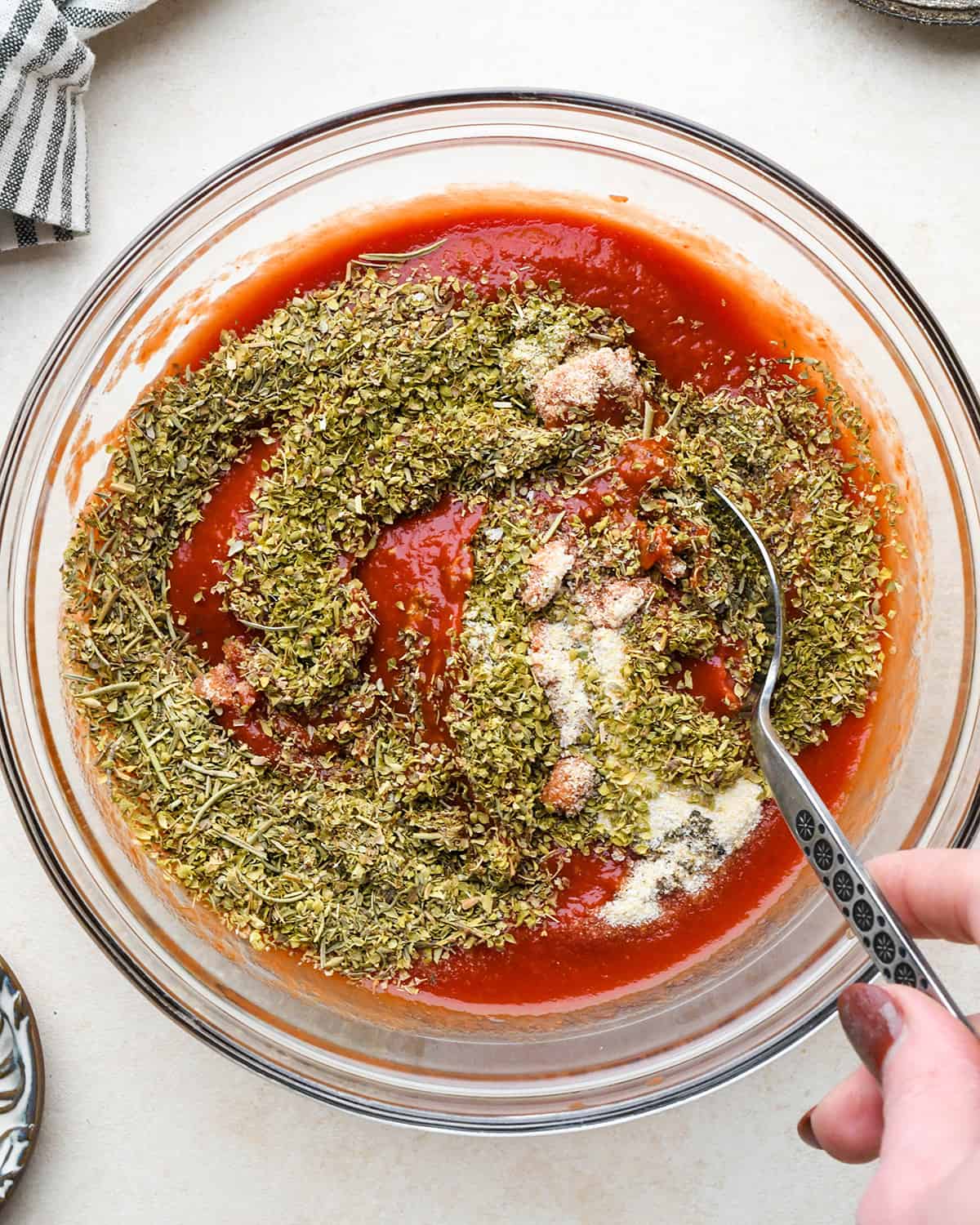 How to Make Pizza - sauce ingredients in a bowl before stirring