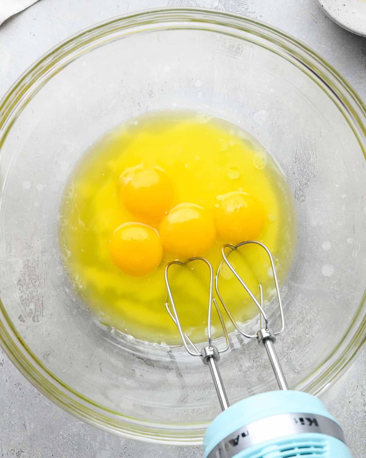 How to Make Waffles - egg yolks in a bowl before beating