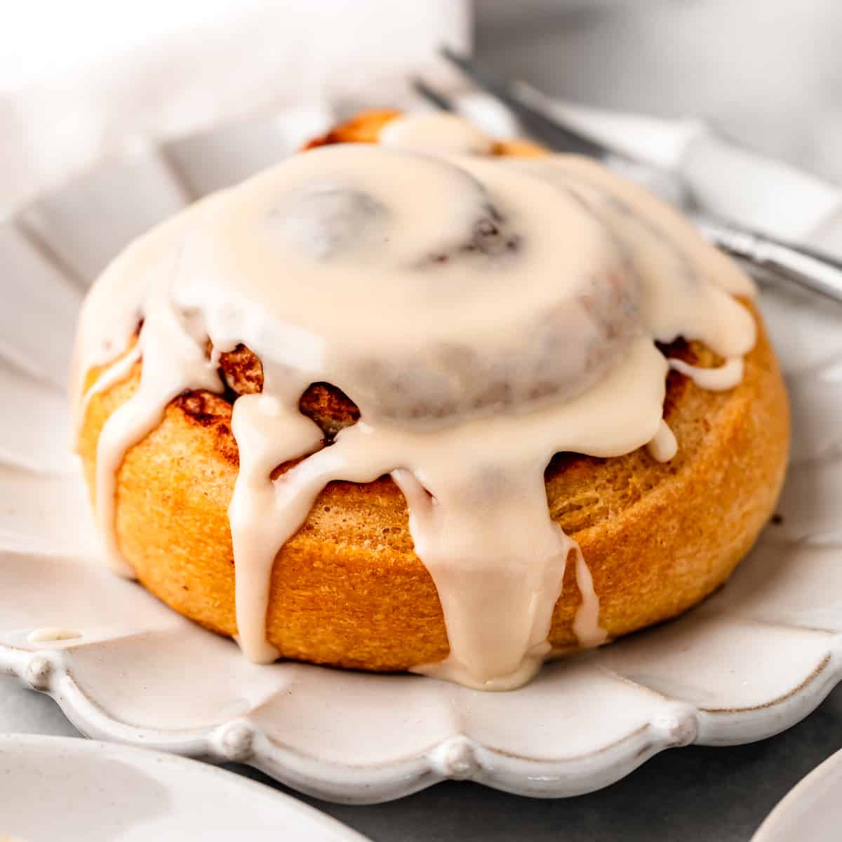 Maple Glaze on top of a cinnamon bun