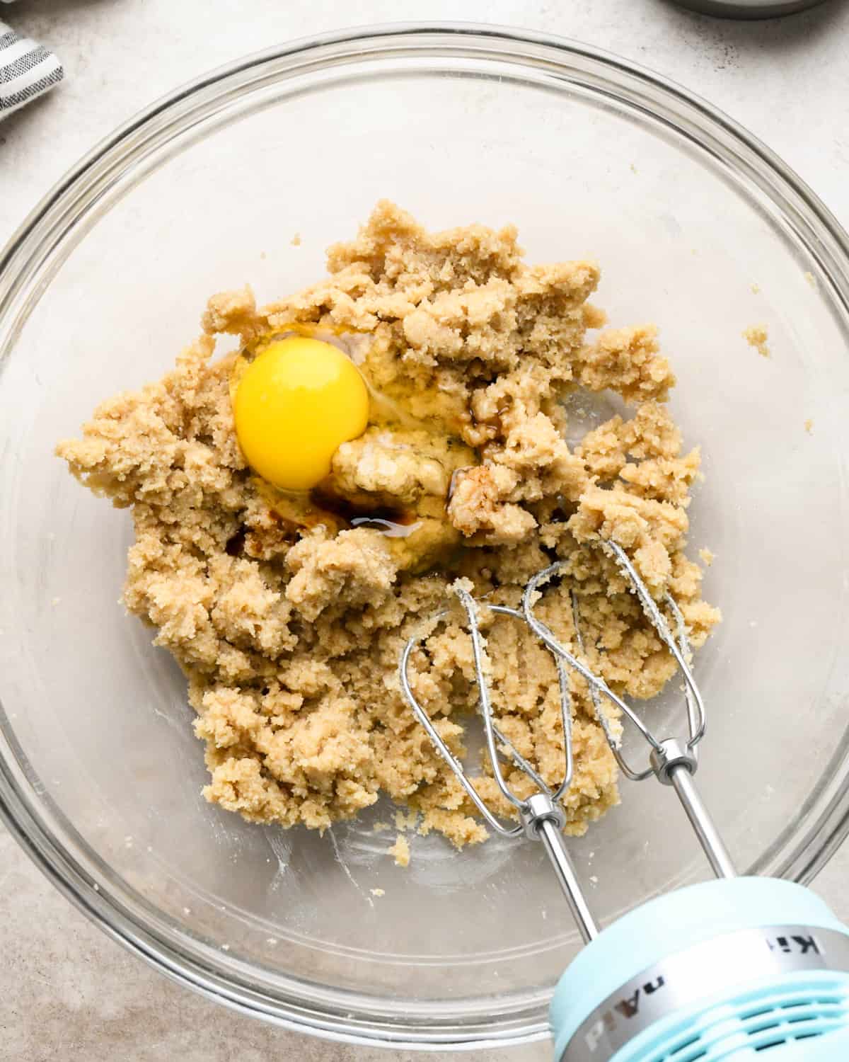 egg and vanilla added to Chocolate Chip Pecan Cookie dough before mixing