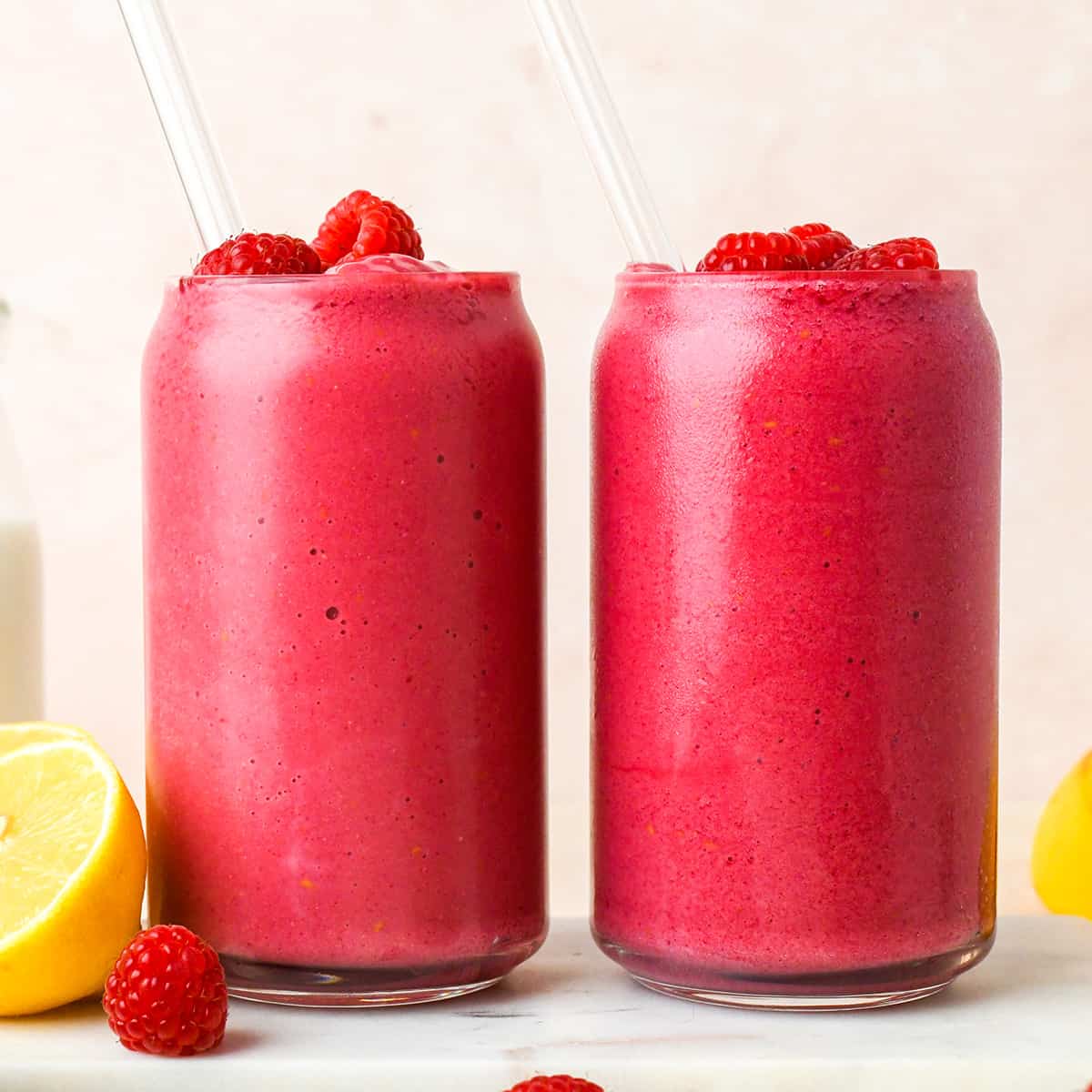 Healthy Smoothie Recipes raspberry smoothie in two glasses